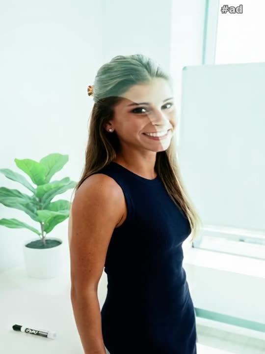 a fitted navy ribbed sleeveless midi dress